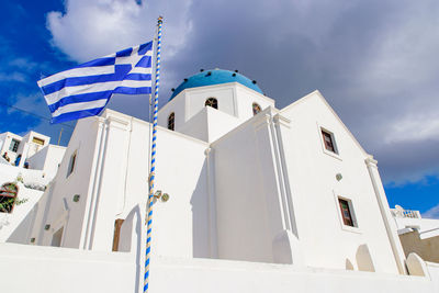 Low angle view of white building against sky