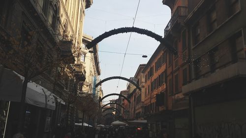 Street in city against sky