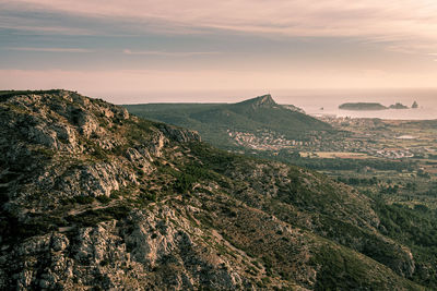 Scenic view of landscape against sky during sunset