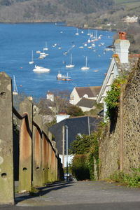 High angle view of buildings by sea