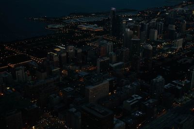 High angle view of illuminated buildings at night