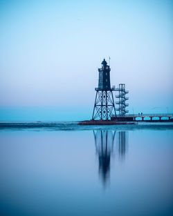 View of lighthouse against clear sky