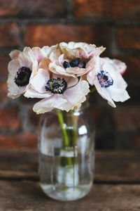 Close-up of white flower vase on table