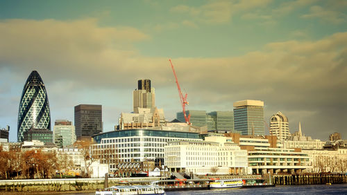 London skyline against cloudy sky