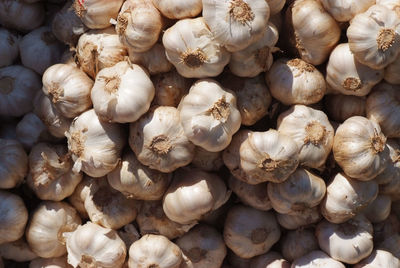 Full frame shot of onions for sale at market