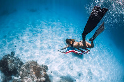 Man swimming in sea