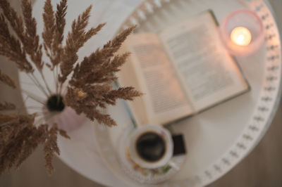 High angle view of coffee cup on table