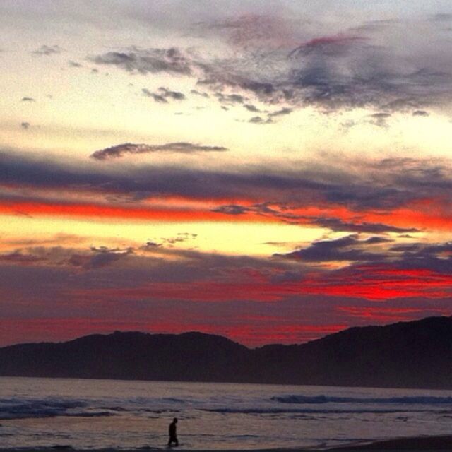 sunset, sea, scenics, water, sky, beauty in nature, tranquil scene, tranquility, silhouette, mountain, beach, orange color, cloud - sky, idyllic, nature, vacations, shore, horizon over water, cloud