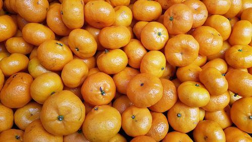 Lots of oranges on the market stalls.