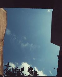 Low angle view of built structure against blue sky