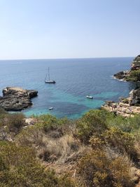 Scenic view of sea against clear sky