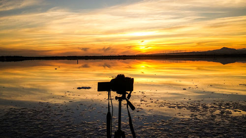 Scenic view of sea at sunset