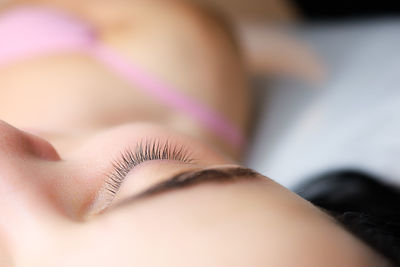 Close-up of woman lying down