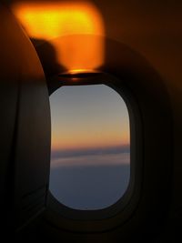 Close-up of sea seen through airplane window