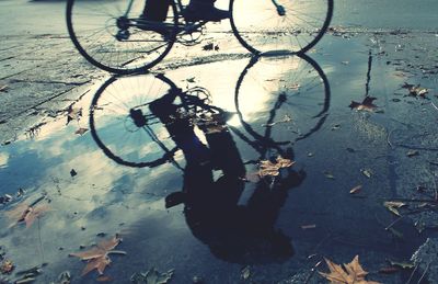 High angle view of bicycle on puddle