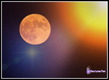 Low angle view of moon at night