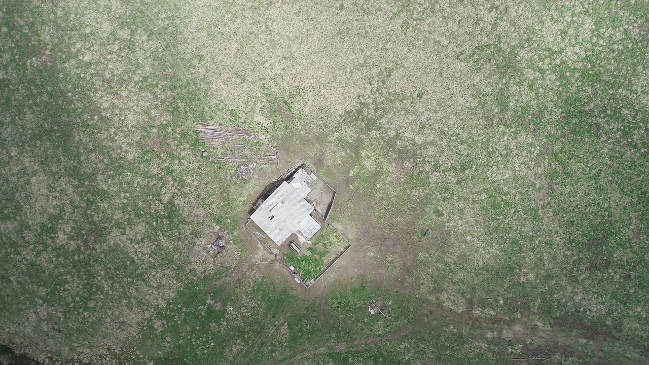 HIGH ANGLE VIEW OF OLD ABANDONED PLANT