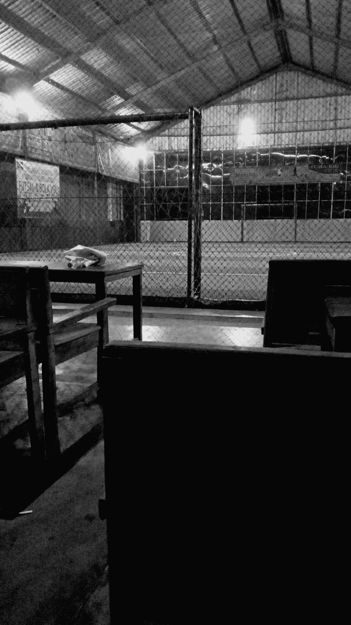 black, black and white, indoors, monochrome, darkness, monochrome photography, light, architecture, seat, built structure, ceiling, no people, white, furniture, table, lighting, absence, empty, day, building, bench