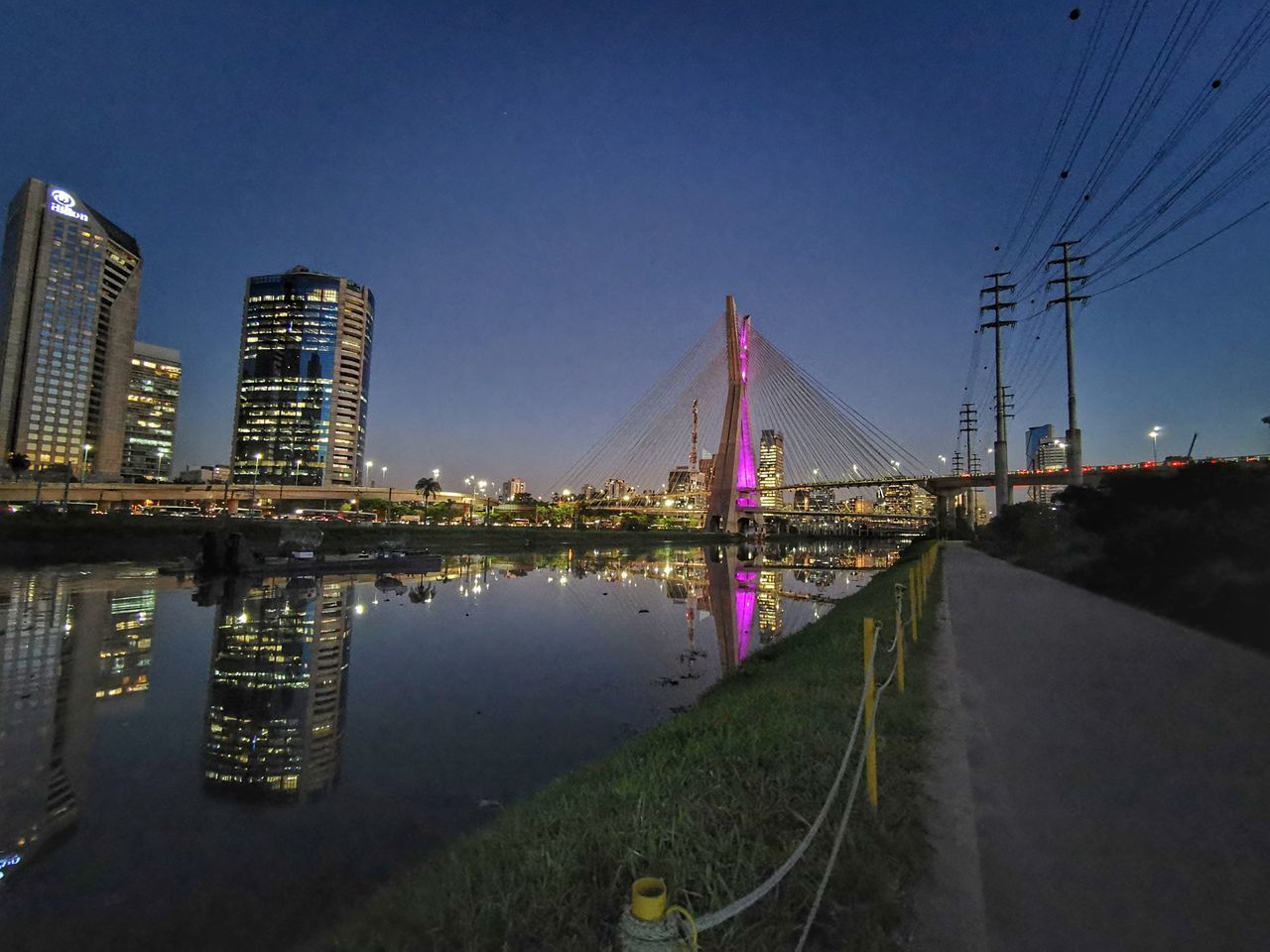 VIEW OF BRIDGE OVER RIVER IN CITY