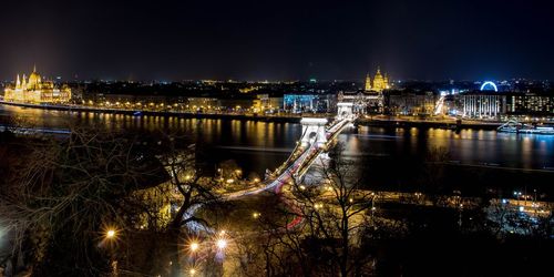Illuminated buildings in city at night