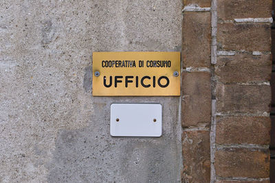 Close-up of text on wall