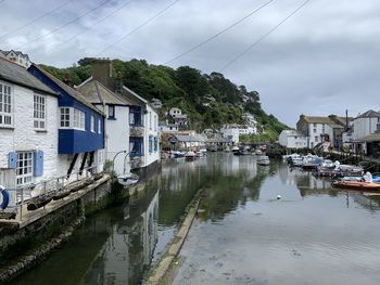 Boats moored at harbor