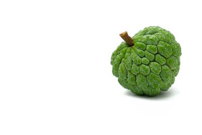 Close-up of fruits against white background