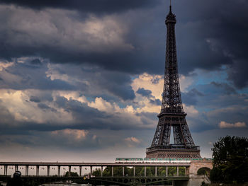 View of tower against cloudy sky