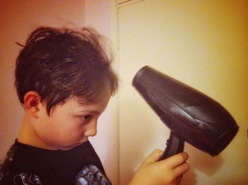 Close-up of boy at home