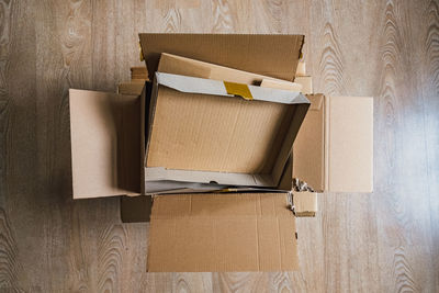 Stack of box on wooden floor