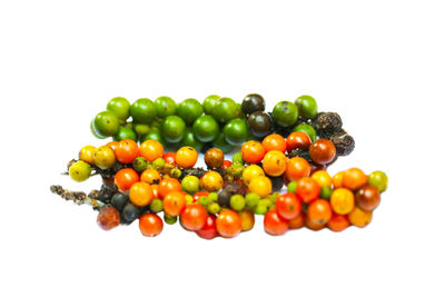 High angle view of tomatoes against white background