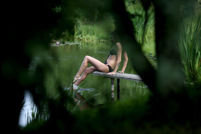 Woman relaxing in lake