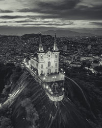 High angle view of illuminated buildings in city