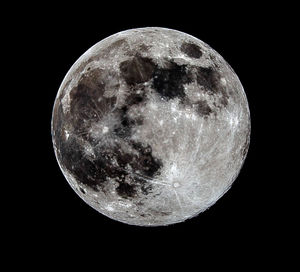 Low angle view of moon against sky at night