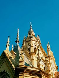 Low angle view of cathedral against blue sky