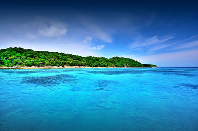 Scenic view of calm sea against sky