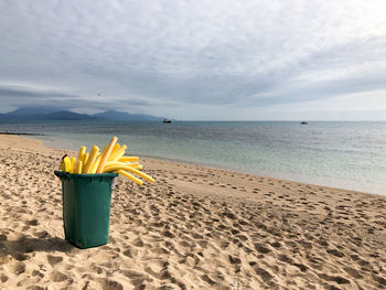 Scenic view of beach against sky