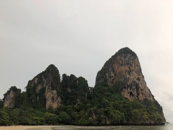 Rock formations on mountain against sky