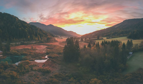 Scenic view of mountains against sky during sunset