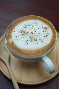 Close-up of coffee cup on table