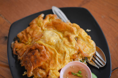 High angle view of breakfast served on table