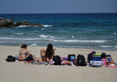 People sitting on beach