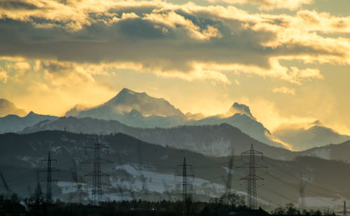 Scenic view of mountains against sky during sunset