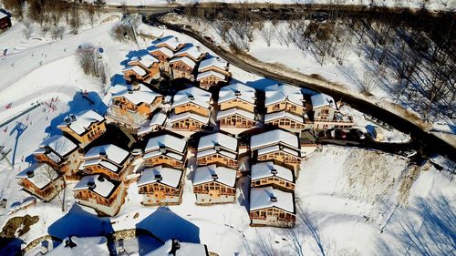 Low angle view of building covered with snow