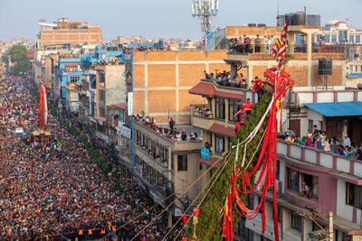 Devotees pull chariots as they take part in the festivities to mark the rato machindranath chariot.