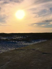 Scenic view of sea at sunset