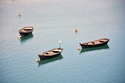 High angle view of boats moored in lake