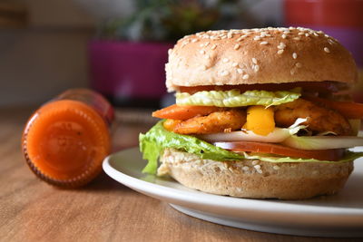 Close-up of burger in plate on table