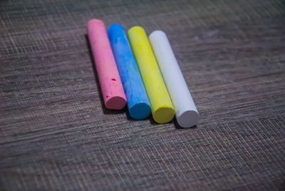 Close-up of multi colored pencils on table