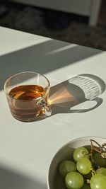 Close-up of wine in glass on table